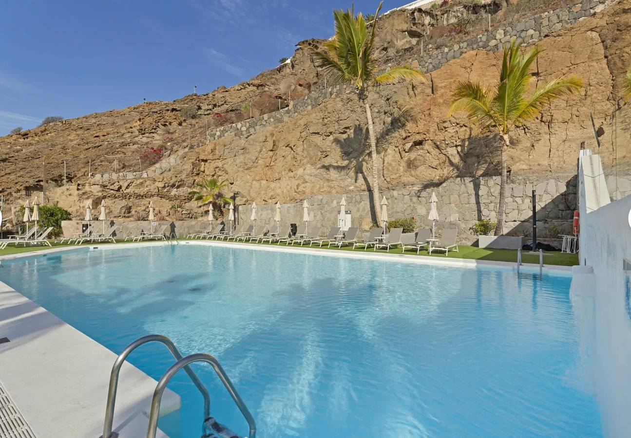 Entire apartment, Holiday Apartment 'Amazing' with Sea View, Shared Pool and Wi-Fi in Puerto Rico (Gran Canaria), South Gran Canaria