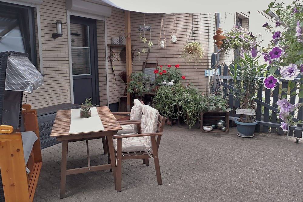 Ganze Wohnung, Xxs Appartement: für 2 Gäste mit Terrasse und Strandkorb - Xxs Appartement in Silberstedt, Grünes Binnenland