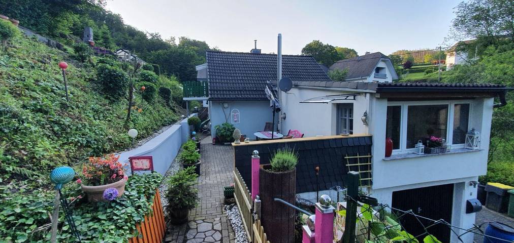 Ferienhaus für 4 Personen, mit Balkon und Garten