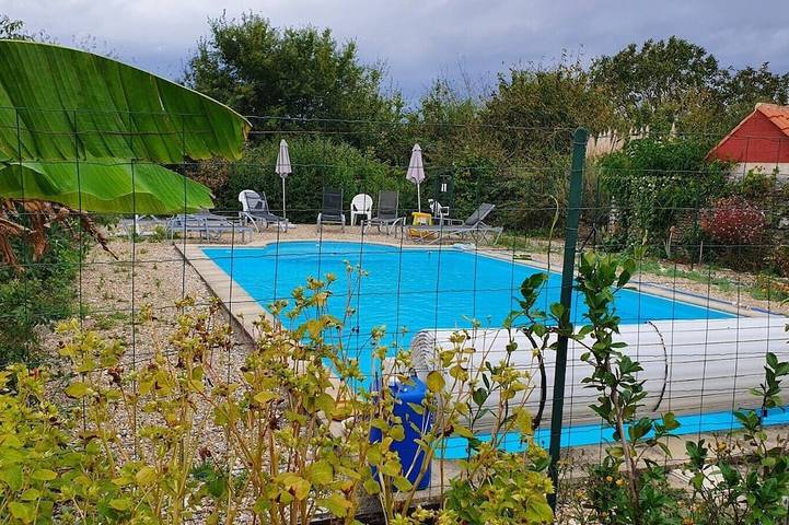 Maison de vacances pour 4 personnes, avec Terrasse ainsi que Jardin et Piscine