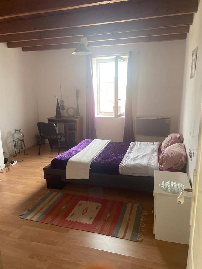 Appartement de vacances pour 2 personnes, avec piscine et terrasse ainsi que jardin et vue