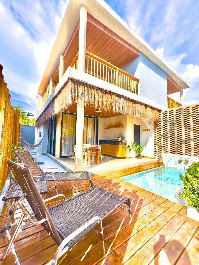 Casas e apartamentos de temporada para 6 pessoas, com vista e piscina e ainda jardim and piscina infantil em Praia do Toque