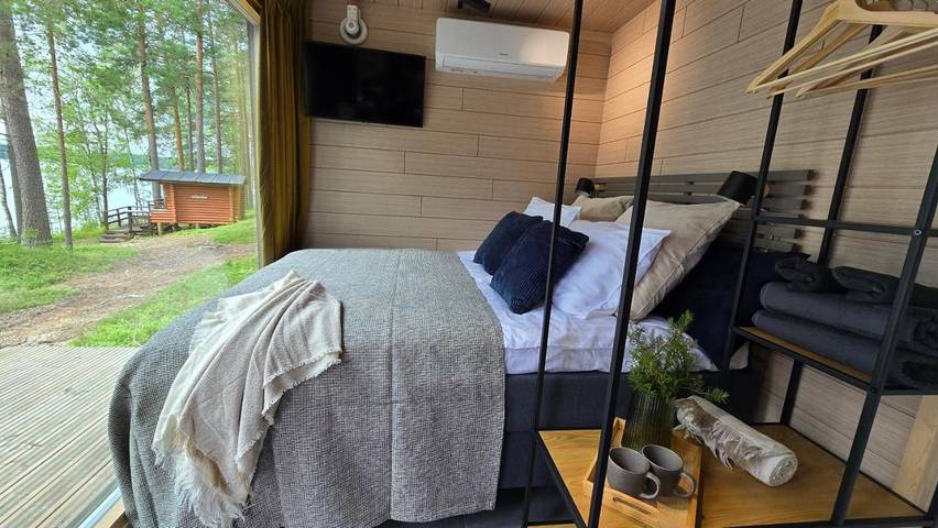 Ferienhaus für 4 Personen, mit Balkon und Terrasse sowie Garten und Sauna in Puumala