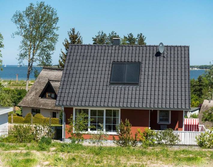 Ferienhaus für 4 Personen, mit Ausblick und Sauna sowie Garten in Kröslin