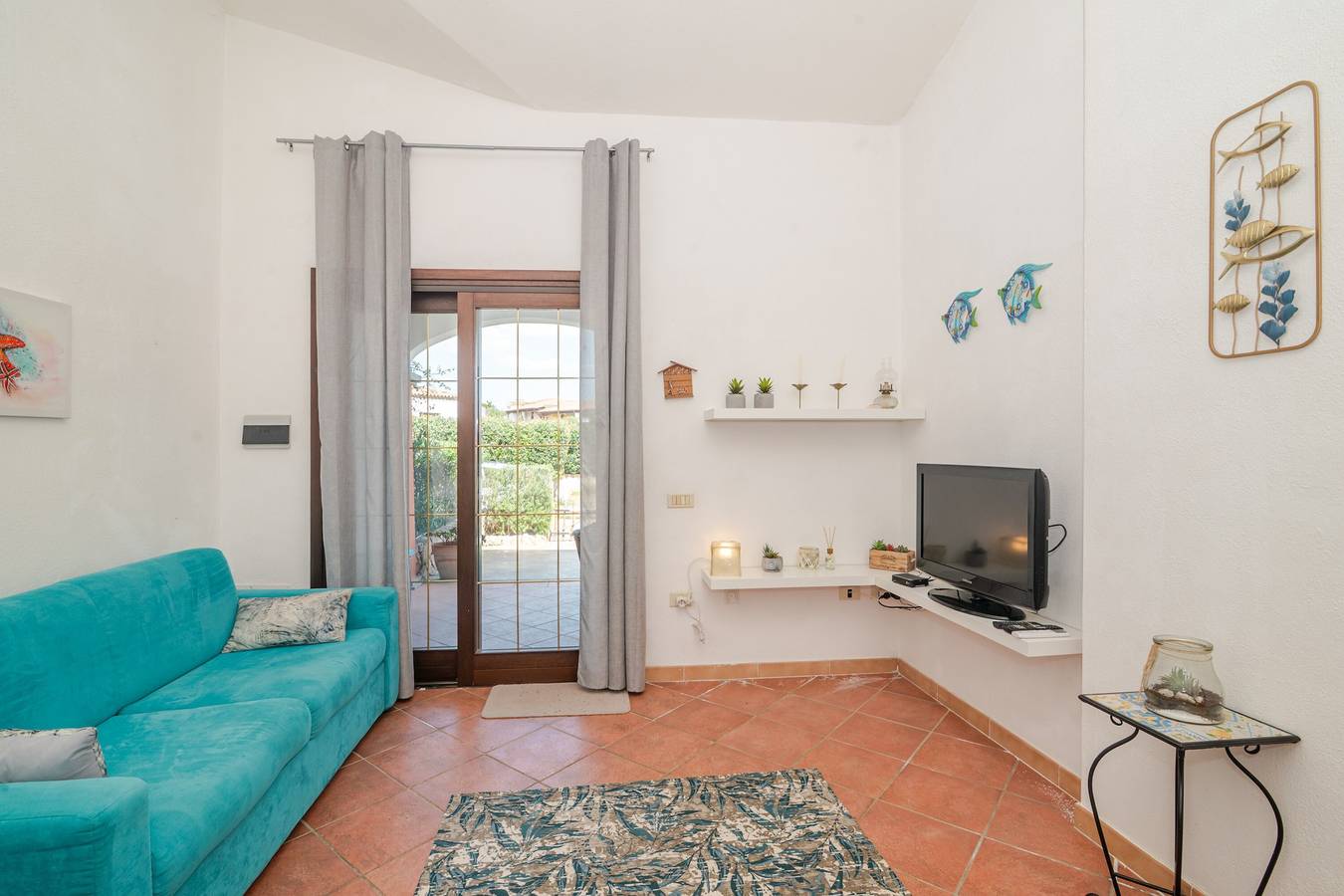 Appartamento intero, Villetta con Giardino, Piscina in Condivisione, Terrazza Privata e Aria Condizionata in Porto San Paolo, Loiri Porto San Paolo