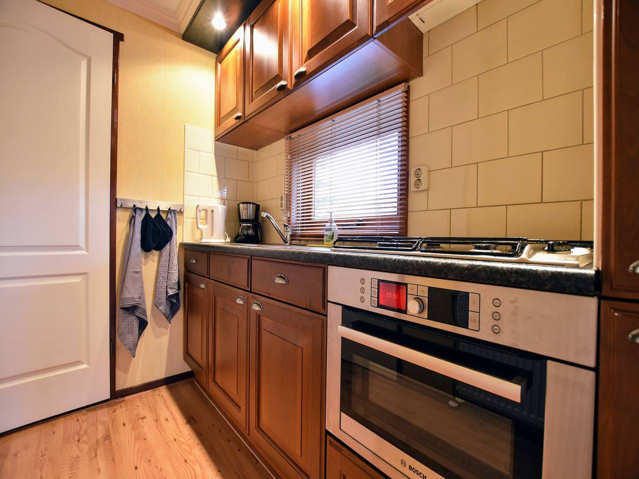 Spacious Chalet in Garderen with Fenced Garden in Veluwe