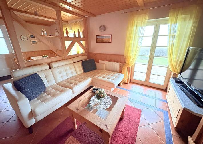Ferienwohnung für 2 Personen, mit Terrasse und Garten sowie Seeblick in Wiek
