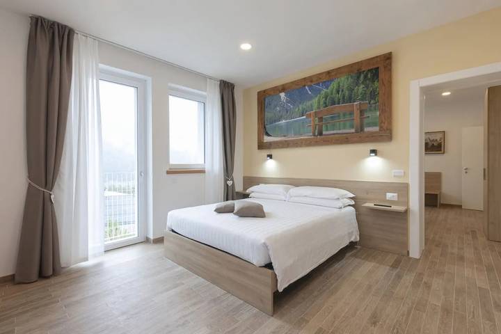 Appartamento per 3 persone, con vista lago e giardino, con animali domestici a Domegge di Cadore