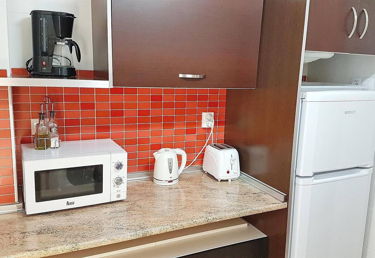 Appartement met groot dakterras, zwembad, tuin, barbecue, airco & Wi-Fi, foto 8