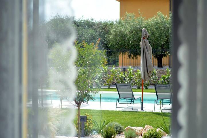 Ferienwohnung für 4 Personen, mit Terrasse und Garten sowie Pool und Ausblick