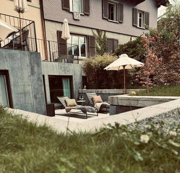 Ferienwohnung für 4 Personen, mit Ausblick und Seeblick sowie Garten und Terrasse in Brienz