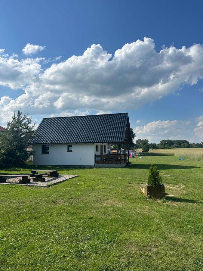 Domek letniskowy 6-osobowy całoroczny nad jeziorem Wilczyńskim, basen, jaccuzi, kajaki rowerki wodne bezpłatnie, duży plac zabaw i wiele udogodnień in Wielkopolska
