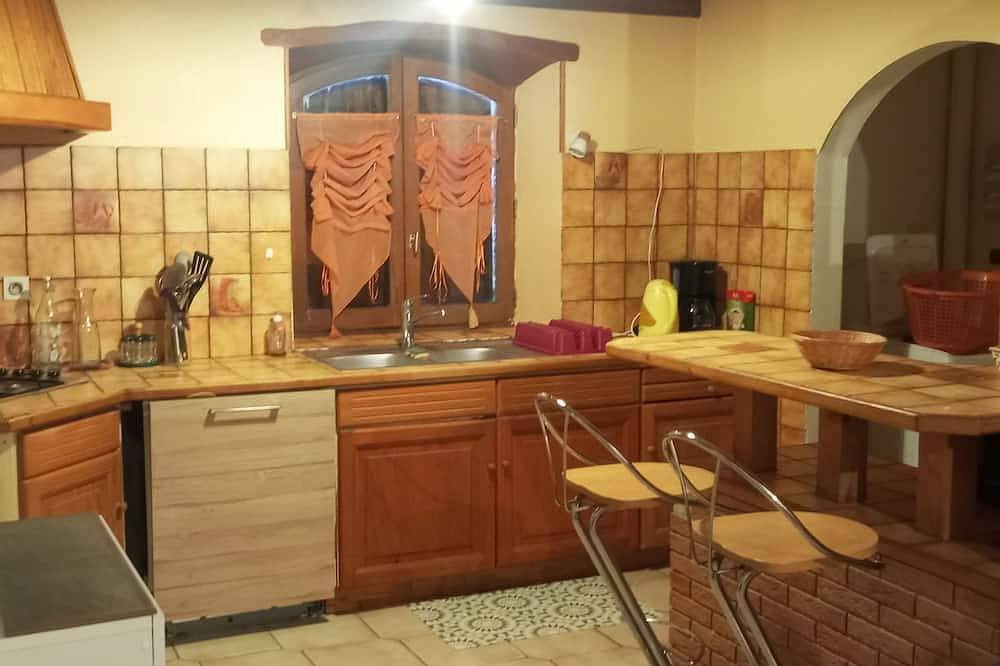 Single-story detached house at the foot of a mountain pass, with a bike garage and a small terrace in Plateau d'Hauteville, Belley