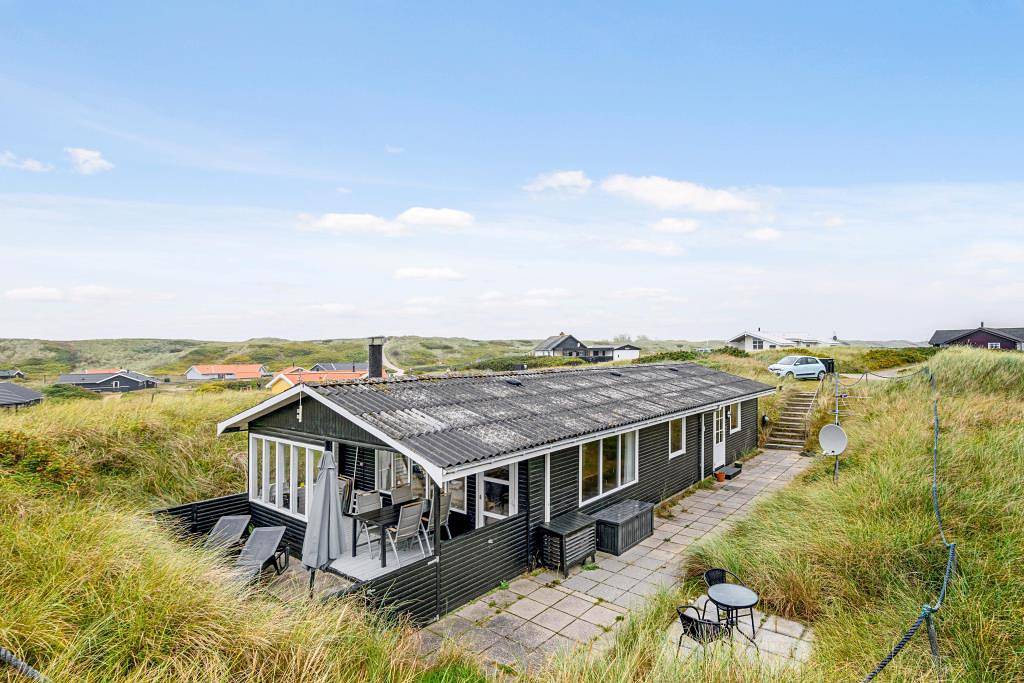 Ferienhaus mitten in den Dünen mit Panoramaaussicht in Bjerregård, Holmsland Klit