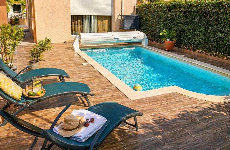 Appartement de vacances pour 4 personnes, avec piscine ainsi que jardin et vue