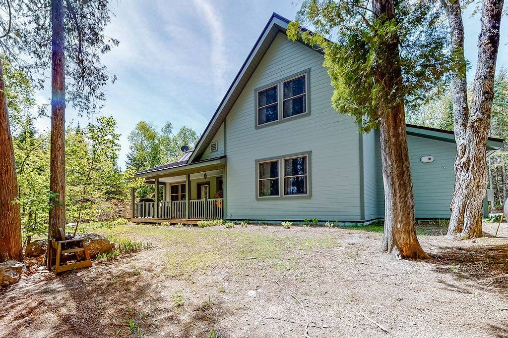 Acre waterfront hideaway with kayak, private dock on Prong Pond & firepit in Moosehead Lake