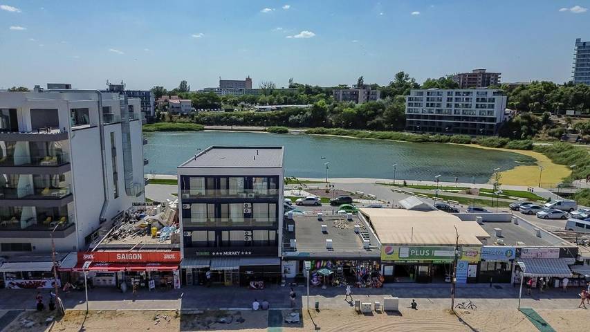 Gästehaus für 3 Personen, mit Ausblick und Seeblick sowie Terrasse - 1