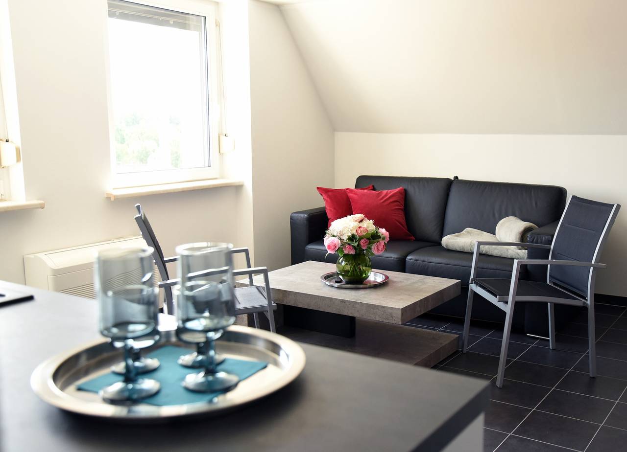 Ganze Ferienwohnung, City Lounge an der Feuerwache mit Außenbereich mit Klimaanlage in Wolmirstedt, Elbe-Börde-Heide