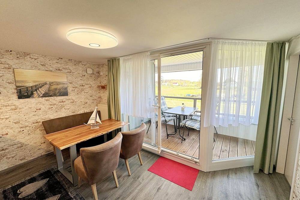 Ganze Wohnung, Wohnung 06 mit Balkon und Boddenblick - Mr: Haus Inselperle mit Blick auf den in Alt Reddevitz, Mönchgut