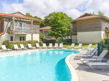 Appartement de vacances pour 4 personnes, avec piscine ainsi que bassin pour enfant et balcon dans Lac d'Aureilhan