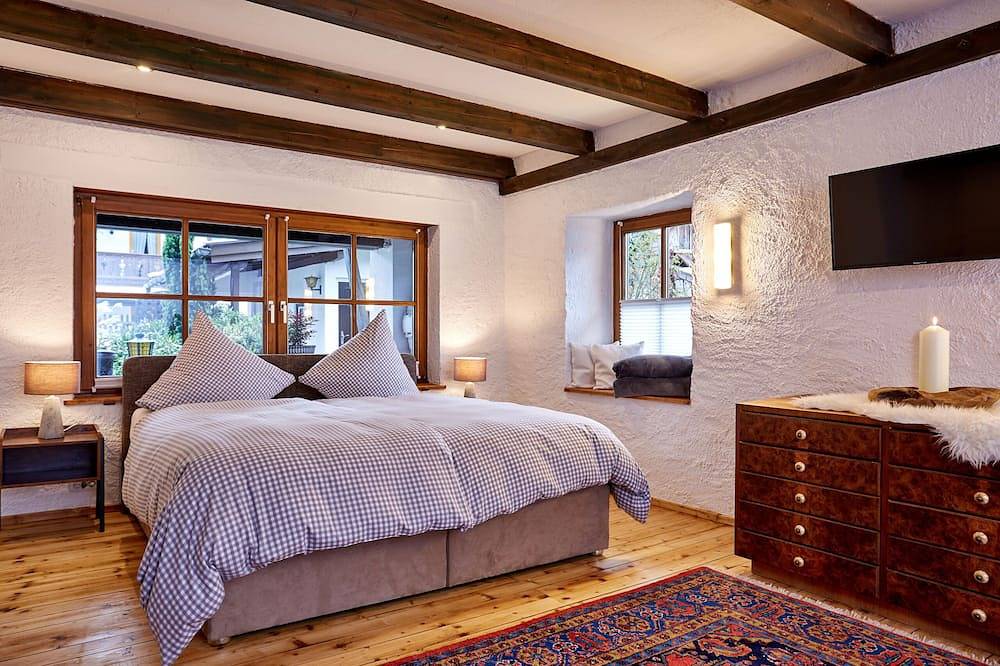 Die Landhausvilla ein Mehrgenerationen Haus mit 480qm Wohnfläche und viel Garten in Garmisch-Partenkirchen, Bayerische Alpen