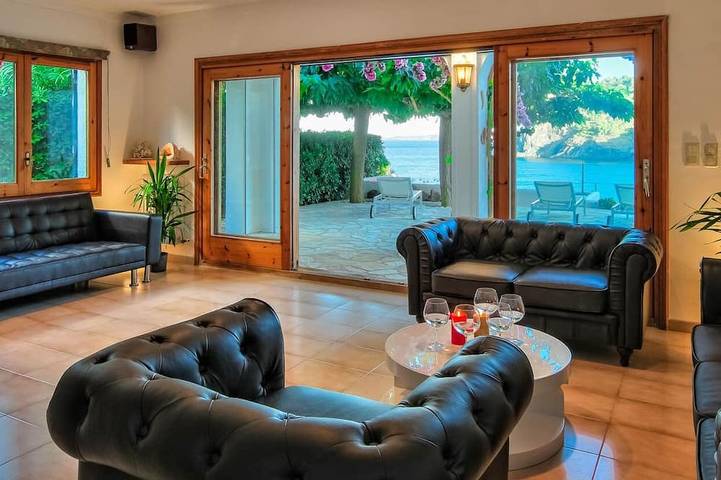 White Rock Villa with Breathtaking Views and a Pool in Cala Rovellada, Colera