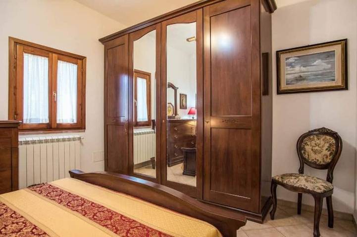 Detached cottage in a landscaped garden with a view of the pool in Fauglia, Riviera Toscana