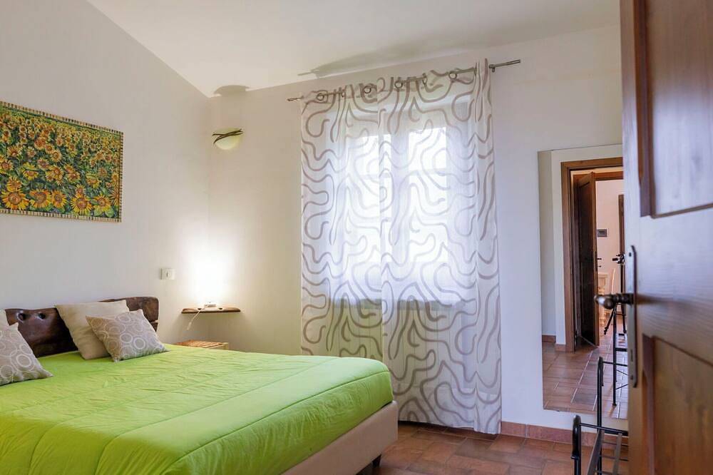 Appartamento intero, Incantevole appartamento per 4 ospiti con Wifi, A/C, piscina, Tv, patio e animali ammessi in Panicale, Lago Trasimeno