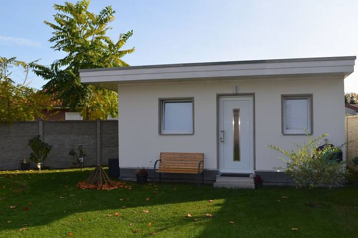 Ferienhaus für 4 Personen, mit Balkon und Garten