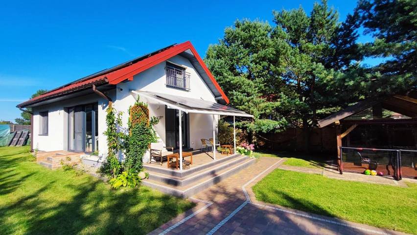 Dom wakacyjny dla 8 osób, z widok na jezioro i ogród oraz widok i sauna w Pasym