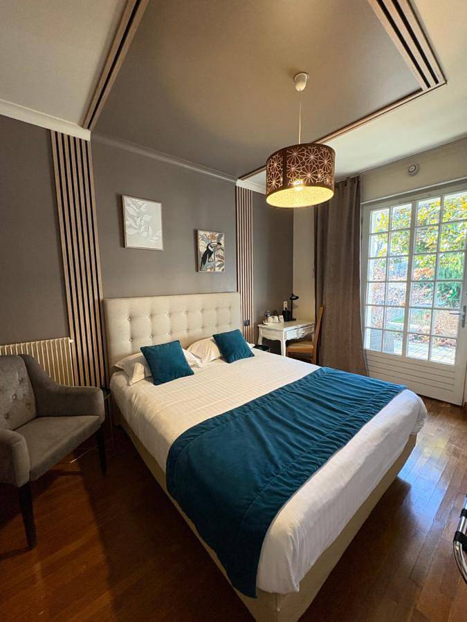 Hôtel pour 3 personnes, avec Terrasse ainsi que Jardin et Vue