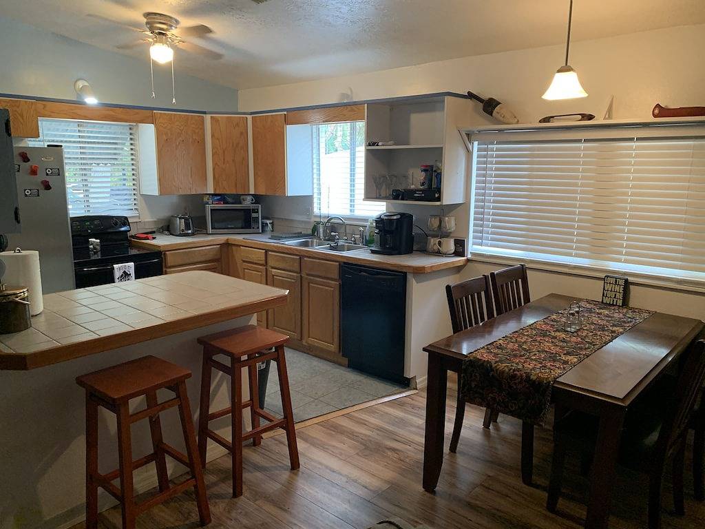 Waterfront Retreat with fenced yard, porch + bar, canal views, New Dock in Homosassa, Citrus County