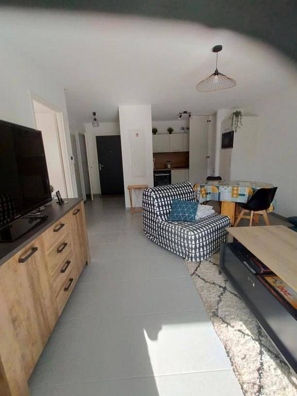 Appartement de vacances pour 5 personnes, avec Terrasse ainsi que Jardin et Vue