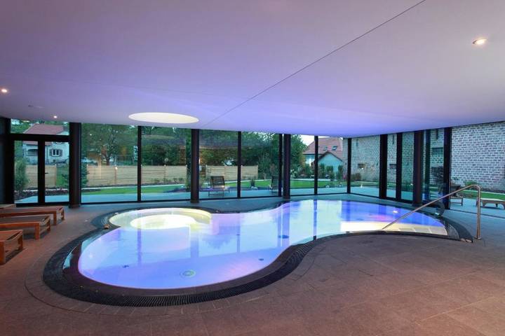 Hôtel pour 4 personnes, avec Jacuzzi et Jardin ainsi que Piscine et Sauna