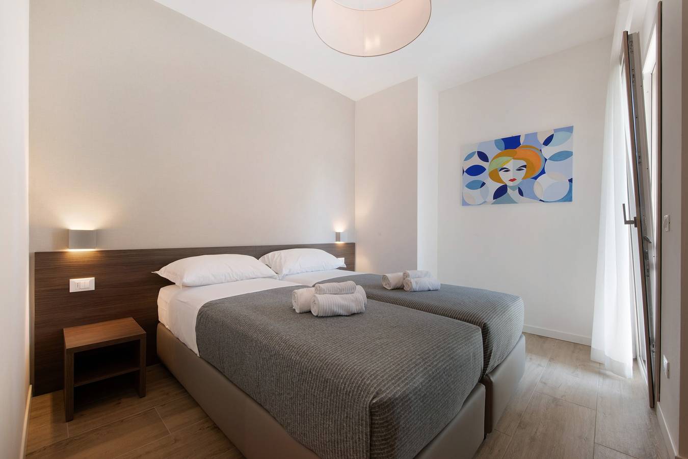 Entire apartment, Apartment 'Eleonora C1' with Shared Pool, Private Terrace, and Air Conditioning in Garda, Garda Mountains