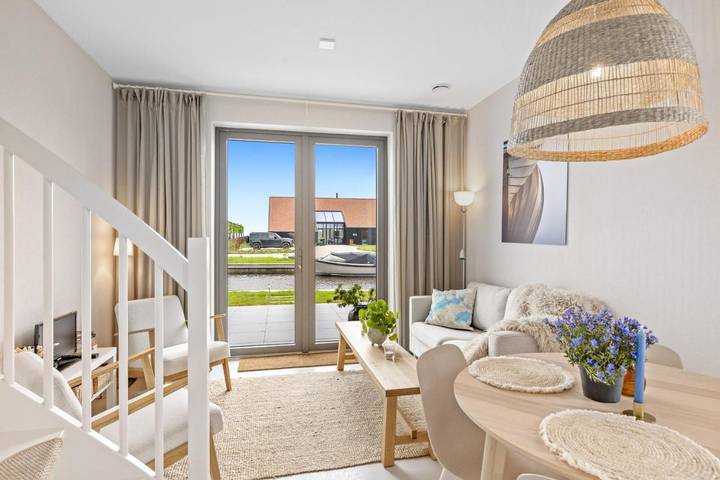 Ferienwohnung für 4 Personen, mit Terrasse und Garten sowie Seeblick und Ausblick