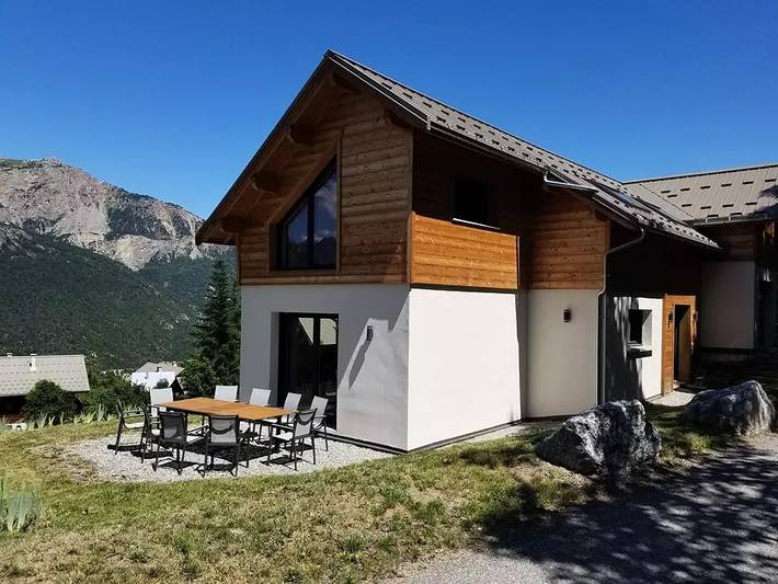 Chalet pour 10 personnes, avec Terrasse ainsi que Jardin et Vue à Puy-Saint-Vincent