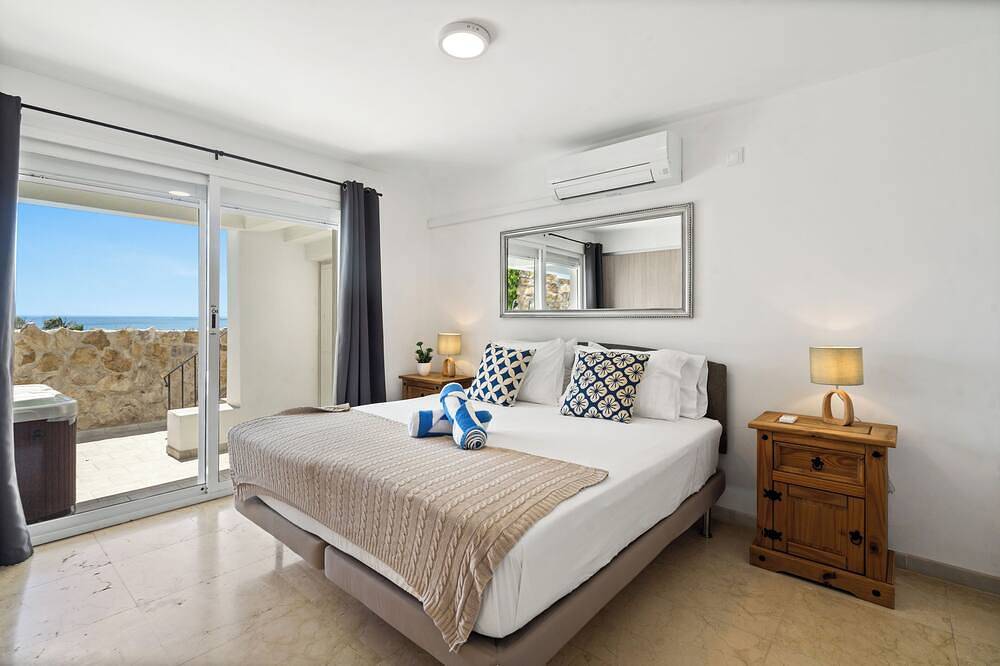 Beach villa with private pool, jacuzzi, sea views, walk to beach, extra pool in Bahia de Casares, Casares