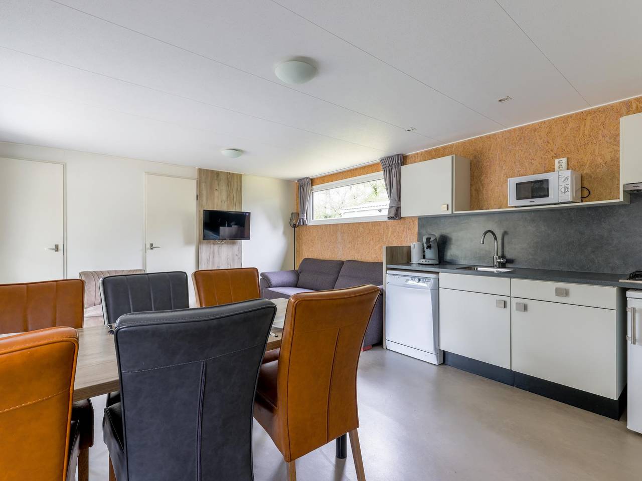 Chalet with covered terrace on campsite with pool in North Brabant