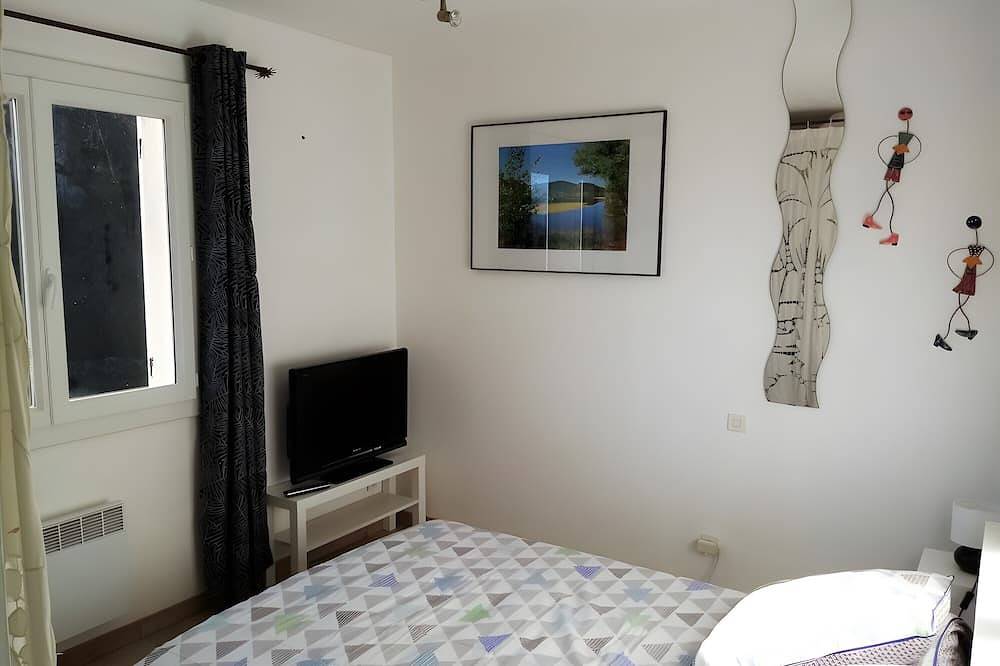 Habitaciones de huéspedes con jardín en casa de Aurore y Laurent in Montarnaud, Región de Lodève