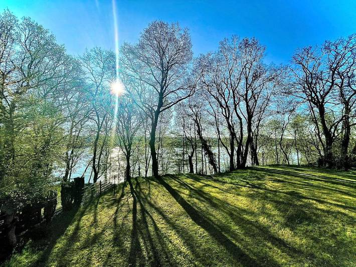 Ferienwohnung für 6 Personen, mit Terrasse und Garten sowie Seeblick und Ausblick