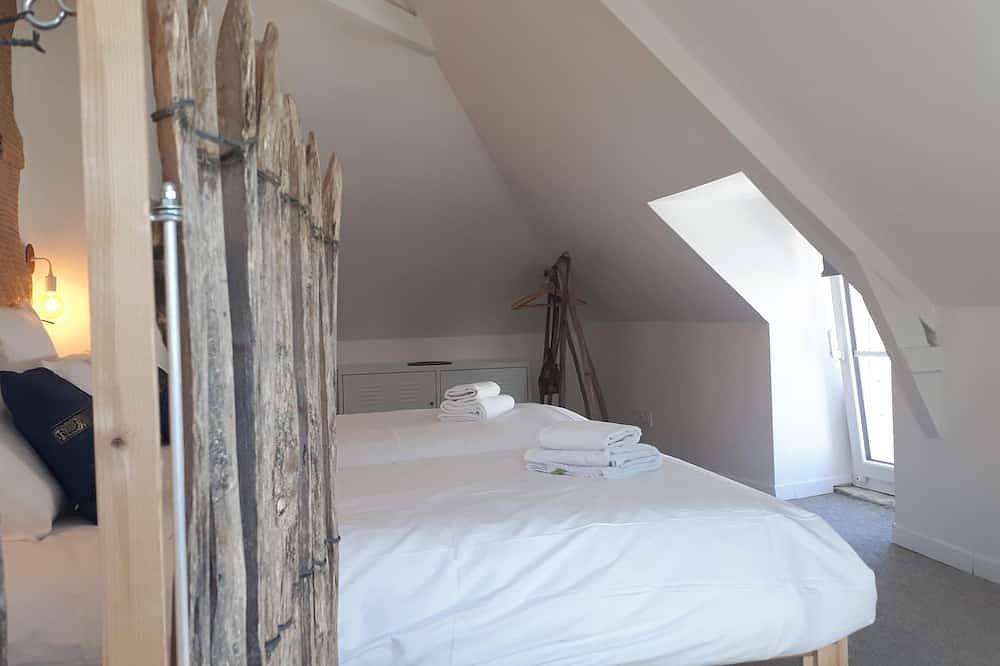 The charm of a small fisherman's house in Port-en-Bessin-Huppain, Bayeux region