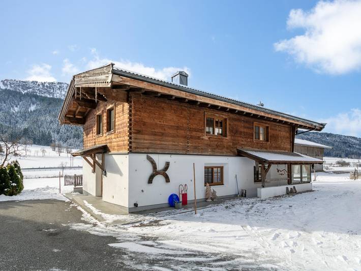 Ferienhaus für 12 Personen, mit Balkon und Terrasse sowie Garten und Sauna in Leogang
