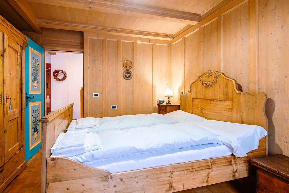 Gemütliche Wohnung in einem Ferienhaus für 5 Leute mit  W-Lan, Tv und Terrasse in Penia, Canazei