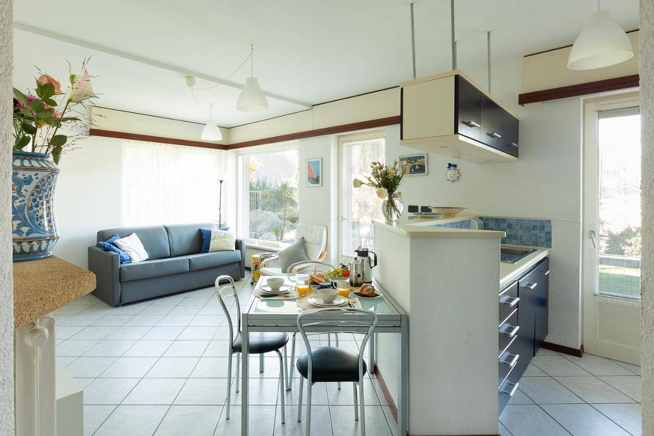Ganze Wohnung, Appartamento in zona panoramica con giardino in Torbole, Nago-Torbole