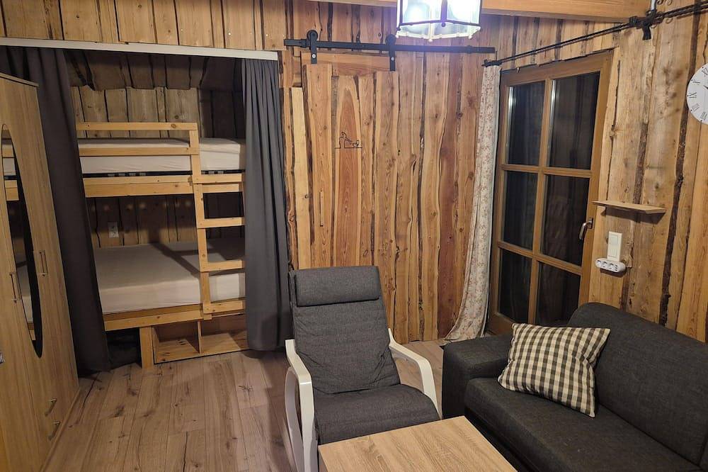 Gemütliches und liebevoll gestaltetes Holzhaus mit großem Grundstück in Ostbayern