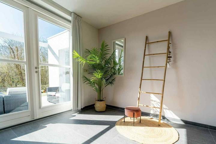 Spacious 8-person holiday home with sauna and outdoor spa in Ouddorp, near the beach. in Ouddorp, Goeree-Overflakkee