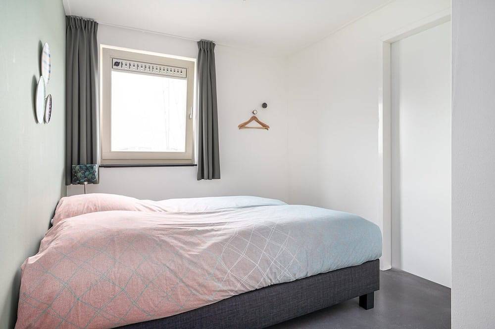 Wohnen Sie in unserem Familienhaus Anchor 14 Wellness, das mit einer Sauna, einem Whirlpool und einer Sonnendusche ausgestattet ist. in Akkrum, Friesland