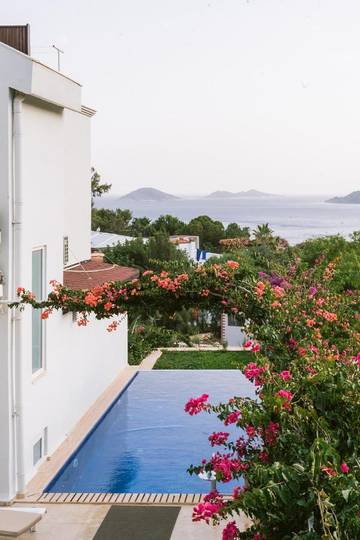 Maison d’hôte pour 10 personnes, avec sauna et jardin ainsi que piscine et vue, animaux acceptés à Kalkan