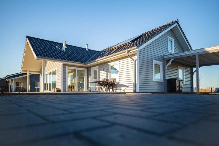 Ferienhaus für 6 Personen, mit Garten und Ausblick sowie Seeblick, mit Haustier in Wangerland